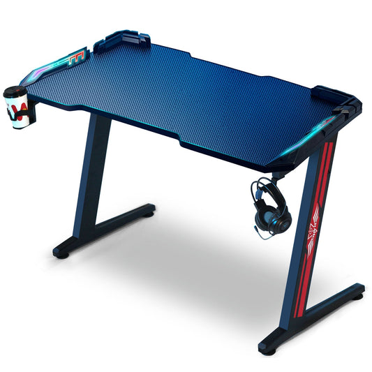 SKY-TOUCH Gaming Desk,Ergonomic Computer and Gaming Table Z Shaped for Pc, Workstation, Home, Office with LED Lights Carbon Fiber Surface,Cup Holder and Headphone Hook,Blue120¡Á60¡Á75cm